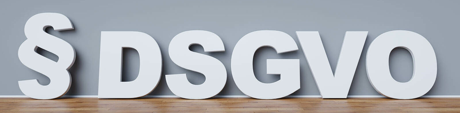 Lettering § DSGVO in white on a grey background