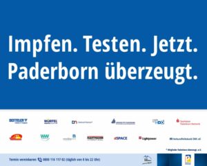 Banner mit dem Text Impfen. Testen. Jetzt. Paderborn überzeugt. und Logos verschiedener Unternehmen und Institutionen aus Paderborn darunter, Hinweis zur Terminvereinbarung für Impf- und Testangebote mit Telefonnummer.